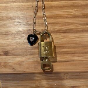 Louis Vuitton Gold Padlock on Necklace with Black Heart Charm
